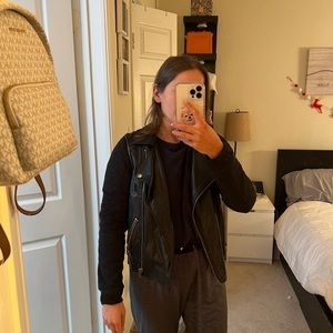 Leather vest with cotton sleeve and zippers